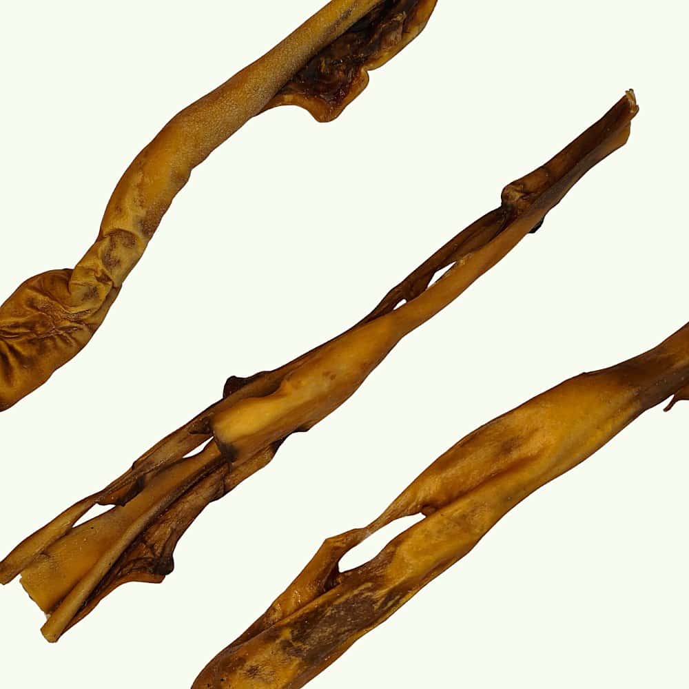 Three venison skin dog chews showing their natural variation in shape